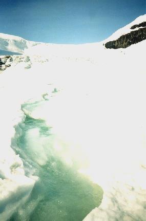 2002-06-12 3 Stream flowing on the Athabasca Glacier, Icefilelds Parkway, Alberta