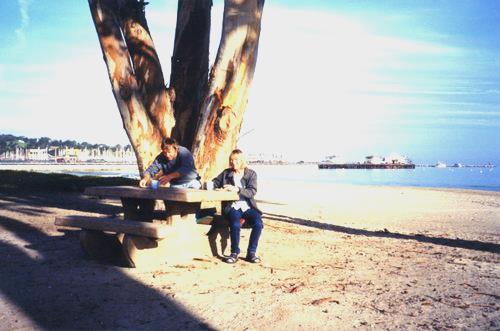 2002-03-12 1 Adrian & Rosie having brekfast on the beach at Monterey, California