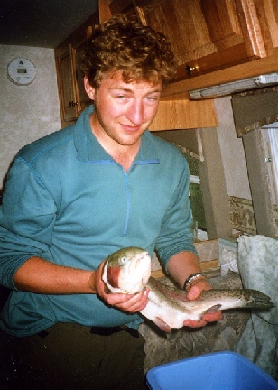 2002-06-08 4 Simon in the Bam with trout, Kananaskis, Alberta