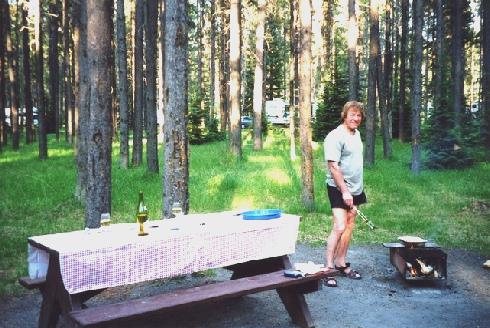 2002-06-12 18 Adrian having a barbie with new tablecloth at Whistlers campsite, Jasper, Alberta